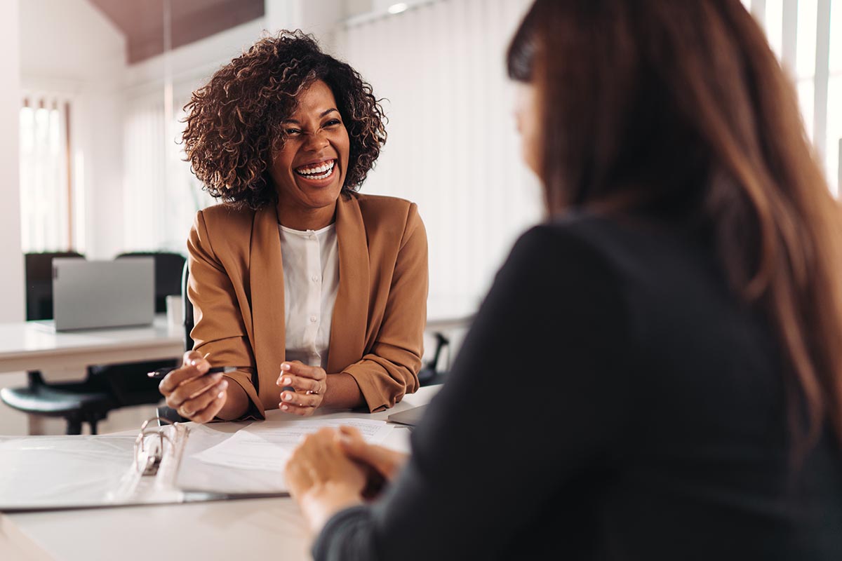 Woman learning how to make patient financial responsibility easy and affordable 