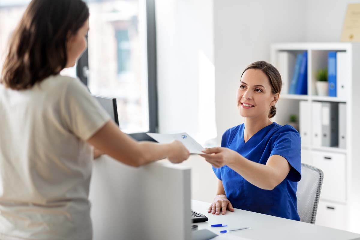 Doctor showing a better way to handle patient pay solutions